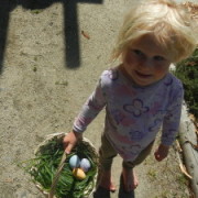 Skye holding her Easter egg basket