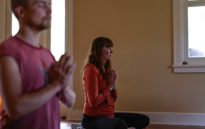 Group meditation at Full Bloom community